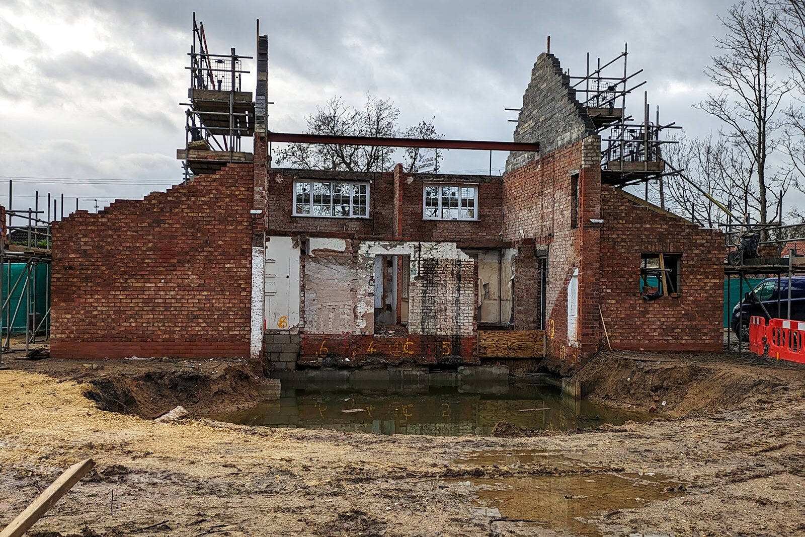 Derelict brick shell of a house stripped back before renovation in Fulford, York